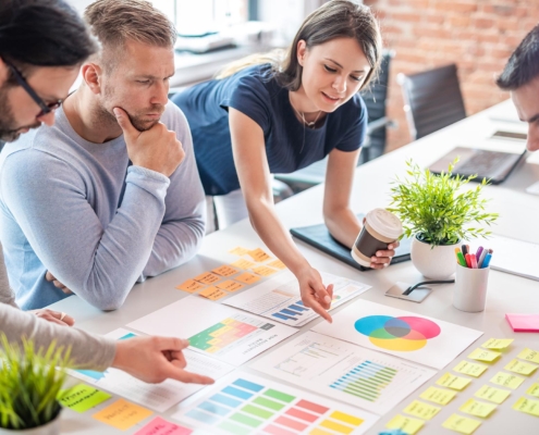 Group of workers discussing marketing